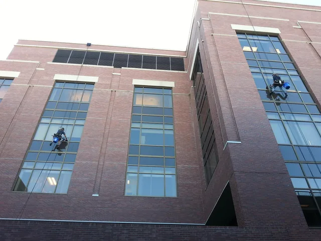 window cleaners, building, squeegee, hospital, skyscraper, window cleaning, glass building, modern building, squeegee, squeegee, squeegee, window cleaning, window cleaning, window cleaning, window cleaning, window cleaning. Window cleaning equipment brands compared