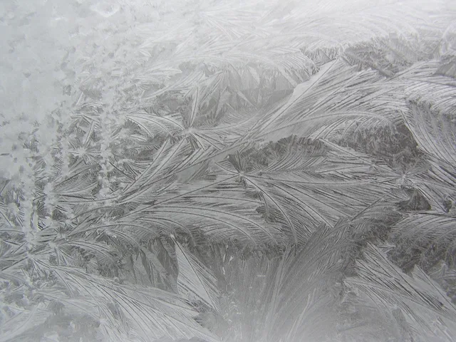 icing, winter window, icing on the window. Window Cleaning Contracts Cold Weather: Winter Clauses