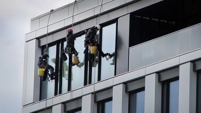 the height of the, work, helmet, the window, washing, rope, the skyscraper, city. 3 rope access standards for high-rise window cleaning in Canada, CSA Z91 and Z271