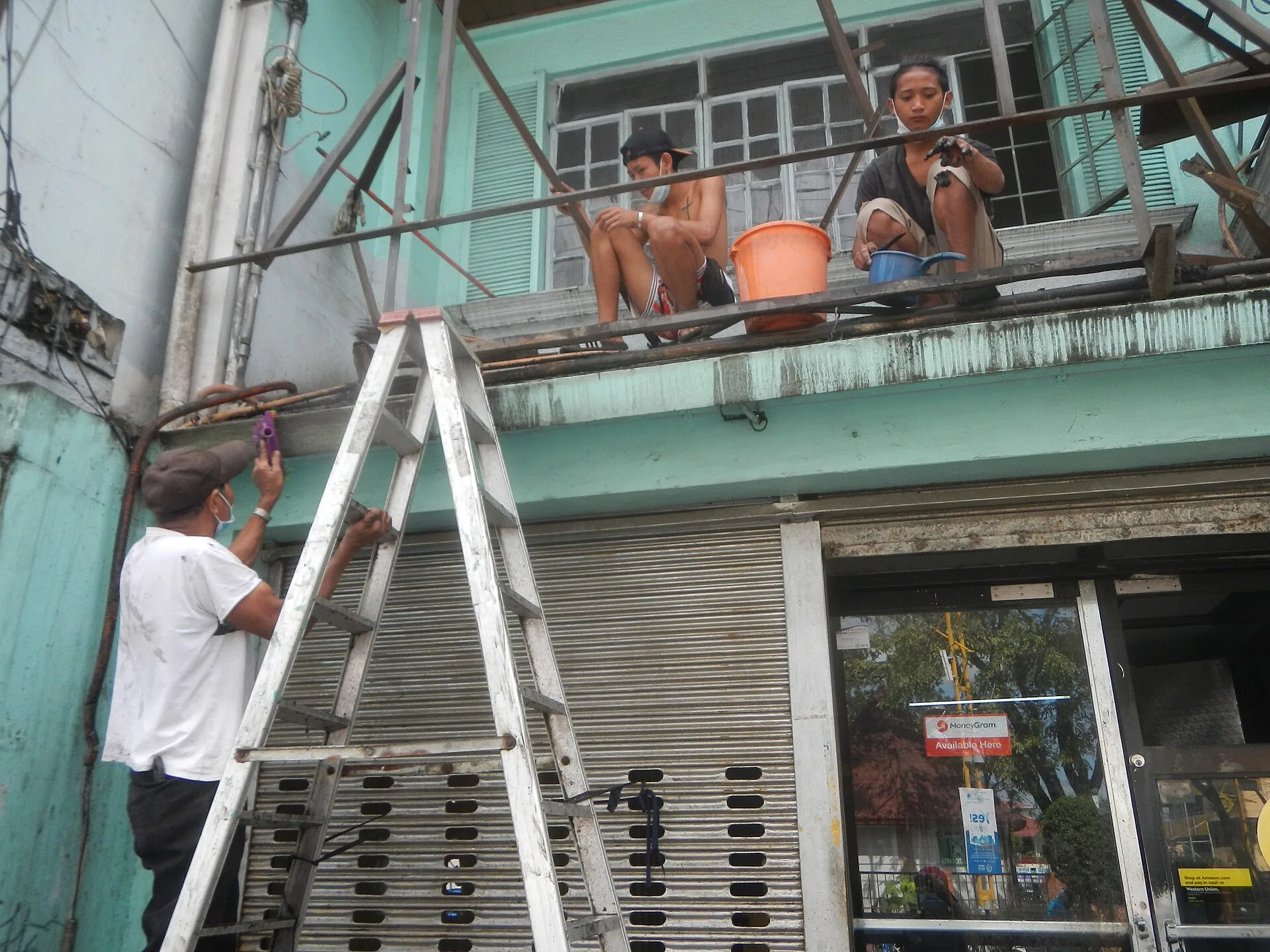 Window cleaners-washers at maintenance work with aluminum step ladders Housekeeping Maintenance (technical) Window cleaner Domestic worker Cleaning Commercial cleaning Cleaning tools. Window cleaning scheduling delays: windows and the call
